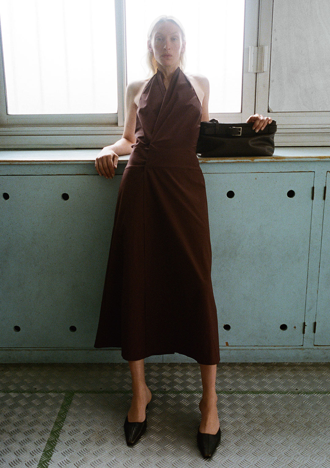 ST AGNI HALTER WRAP DRESS IN LIQUEUR