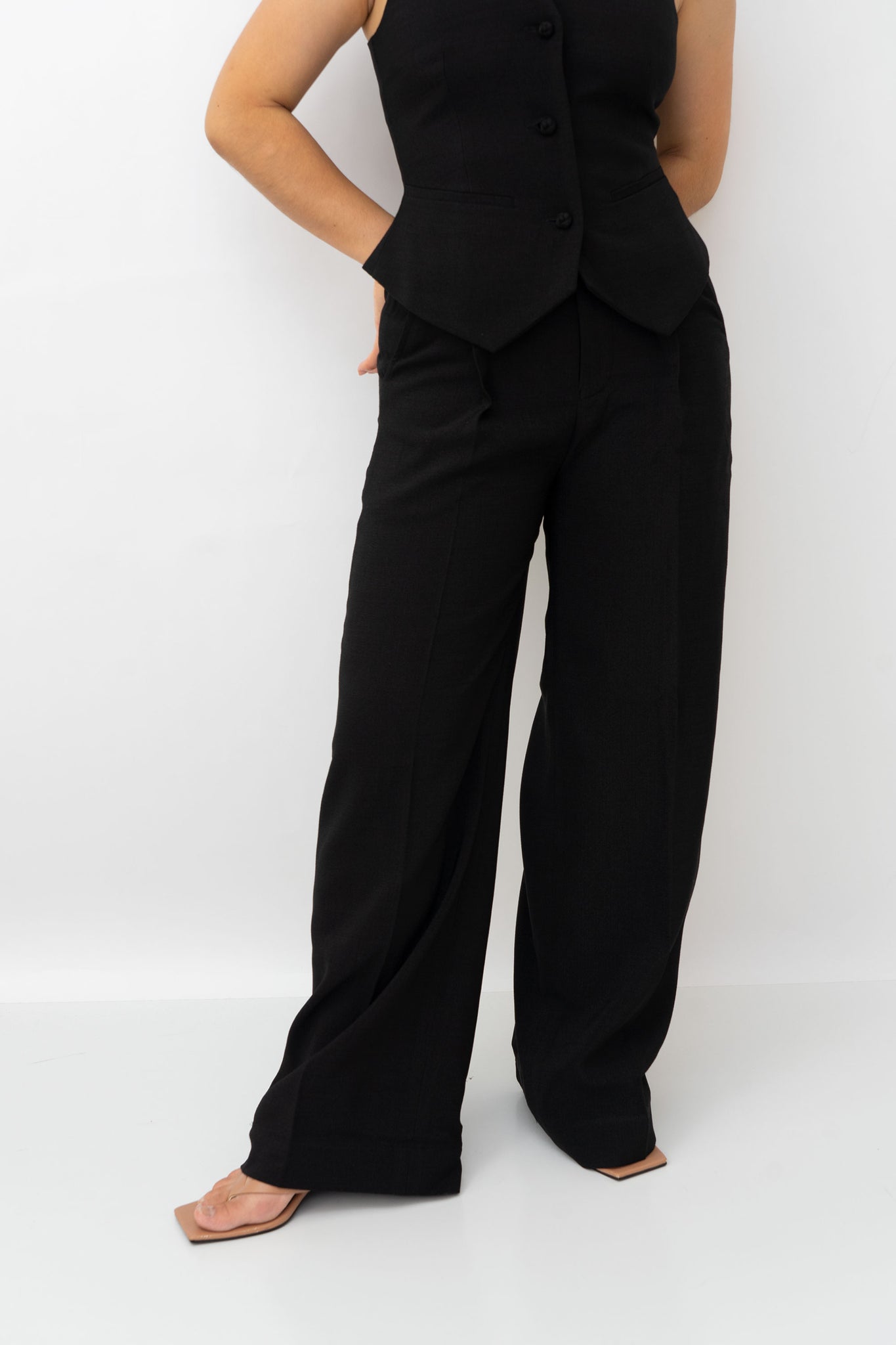 MEL ESSENTIALS HIGH-WAISTED TROUSERS