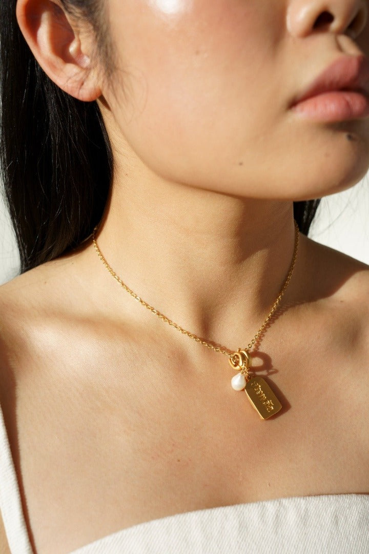 KIN.KO YES SHE CAN NECKLACE