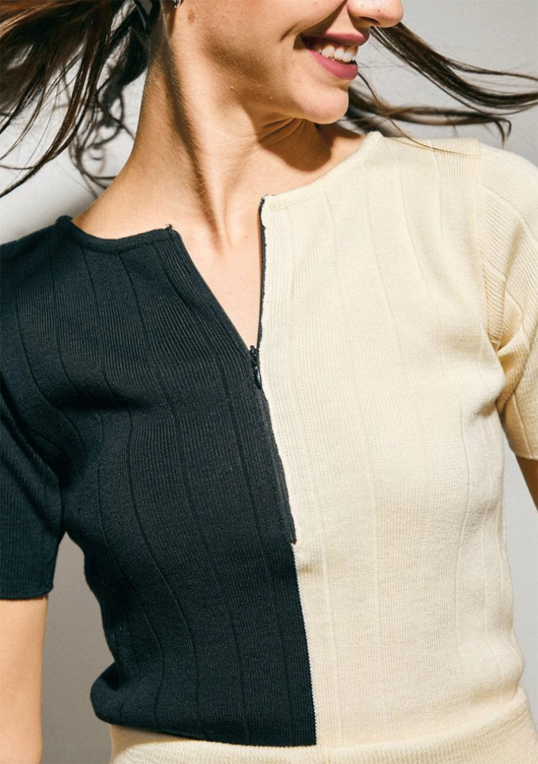 RALLY MOVEMENT ZIPPED UP KNIT TOP